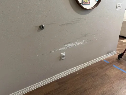 Mom’s new electric wheelchair is destroying the wall. How can I reinforce this area?