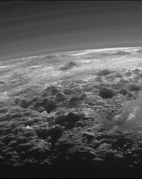One of the rarest landscape ever taken of the outer regions of the Solar System. A Plutonian Landscape.It was captured from a range of about 18,000 kilometers when New Horizons looked back toward Pluto, 15 minutes after the spacecraft's closest approach.