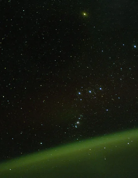 Orion rising above the atmosphere