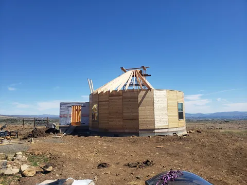 Spent several years building a complete 1300 sq ft roundhouse from top to bottom with my wife, including all framing, electrical, plumbing, HVAC, etc. By far the worst idea we've ever had, and so happy to be in it finally.