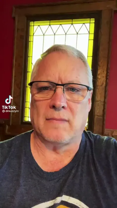 proudly waving his confederate flag