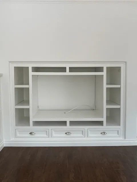 We transformed our 90s entertainment center in a reading nook