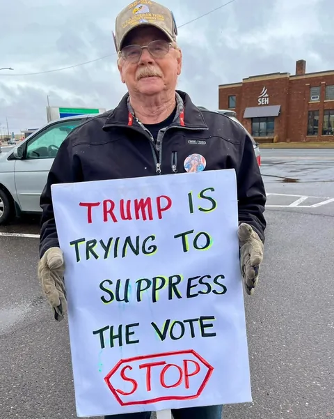 Demonstrators in deep red Barron County, WI remind people of tomorrow's Supreme Court election. [OC]