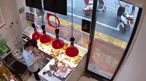 Surveillance footage from a fried chicken shop