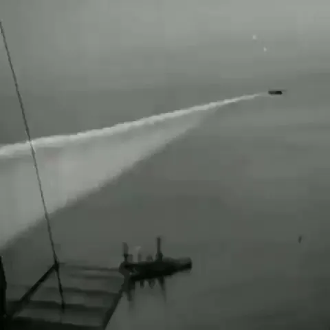 This is Pre-WWII footage of a smoke curtain, used to hide ships during a naval battle, being deployed