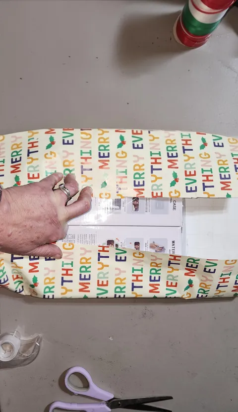 If you cut your wrapping paper to small, Try turning the gift 45 degrees!