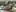 No, these are not toys. These are real cars. This is done with the help of a tilt shift lens.