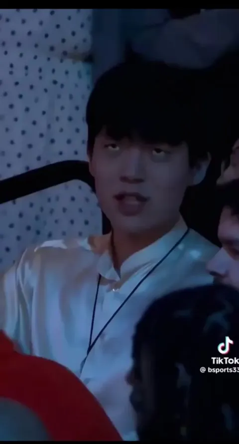 Yang Hansen, a 20-year-old basketball player from China, reacts to getting drafted to the NBA by the Portland Trail Blazers.