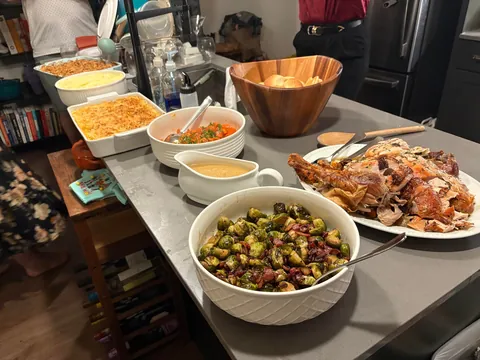 Nervous to share, but cooked [homemade] Friendsgiving spread for my pals - turkey, gravy, taters, sprouts, gb casserole, Mac, rolls, carrots