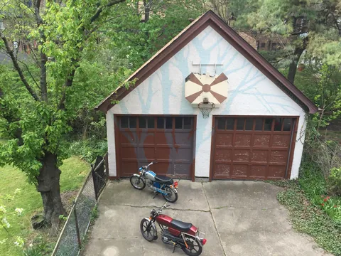 Just had the time to Spring Clean and since we finally finished the concrete floors and got cabinetry installed, I wanted to share! Here is our new, 1920s-styled garage in Detroit with a custom attic elevator, our architectural drawings and images of the original 1927 garage we replaced.