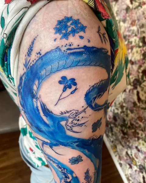 Blue abstract dragon &amp; flowers- my first tattoo by Haruka (Tokyo)