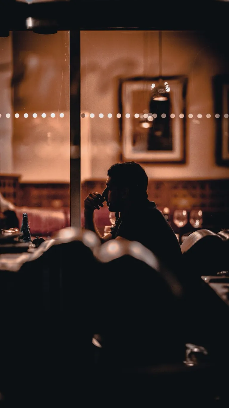 Lonely man at a restaurant
