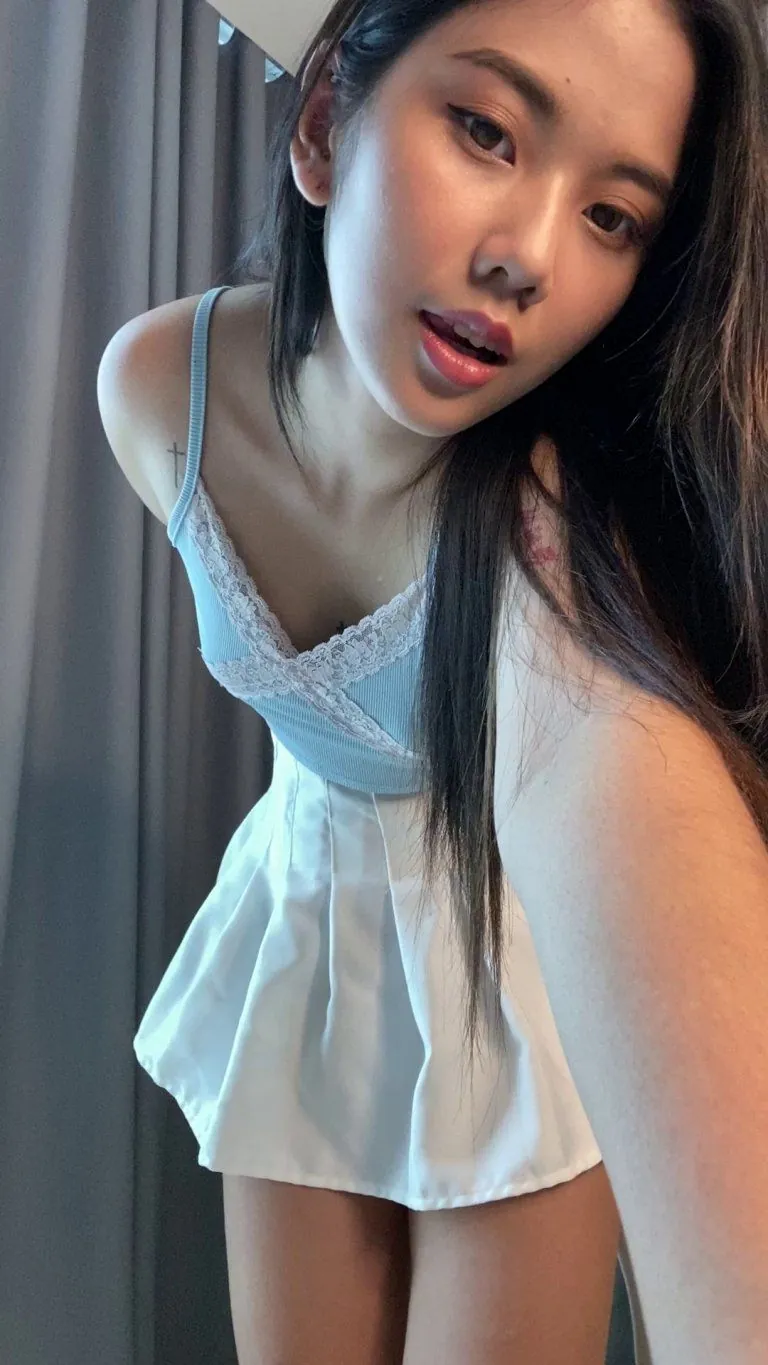 Anyone here a fan of small boobs and a short skirt?