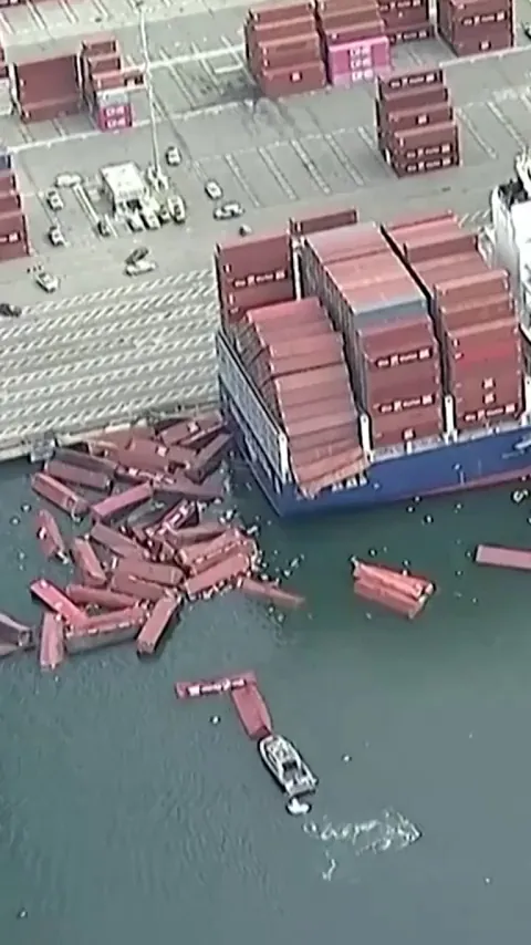 Dozens of shipping containers fell from a cargo ship at the Port of Long Beach, California, on Tuesday, sending them tumbling into the water.