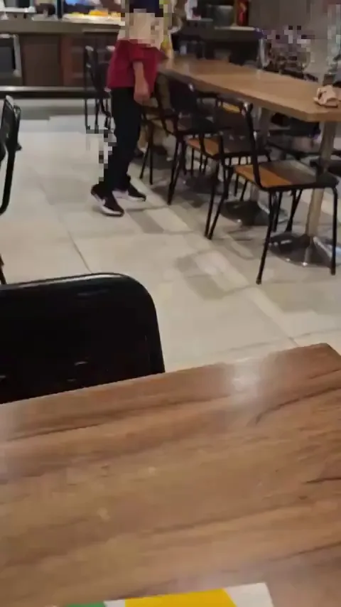 Kid walking on dining table