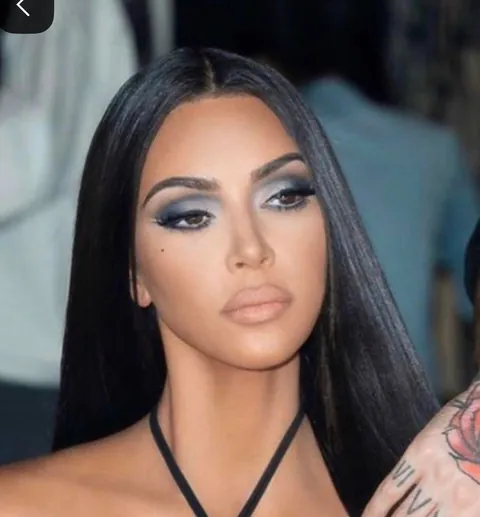 Kim K look on deeper skin tone with gloss added