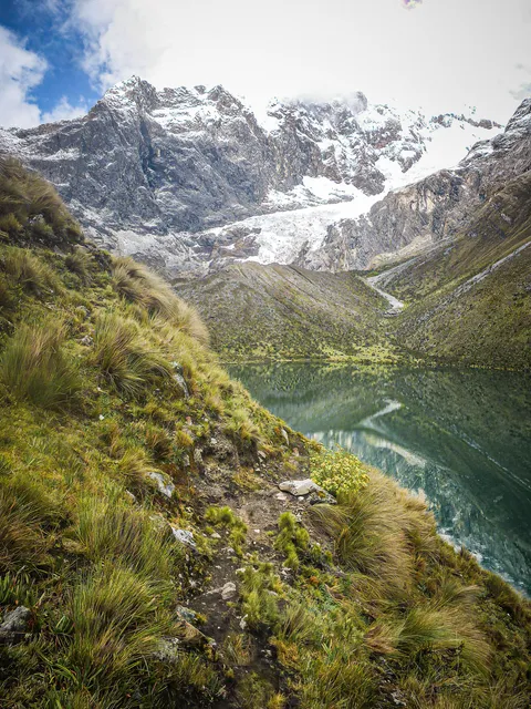 'Most beautiful hike in the world' is what they call the Huayhuash trek - here's the ascent near Quesillococha [OC][2357x3143]