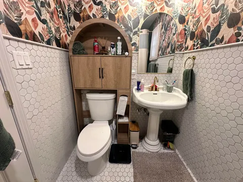 Turned my 1903 three car garage into 1/2 garage and 1/2 bedroom and bathroom my