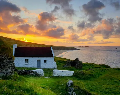 A cottage beside the beach on the Blasket Islands, the most western part of Europe, Kerry, Ireland.