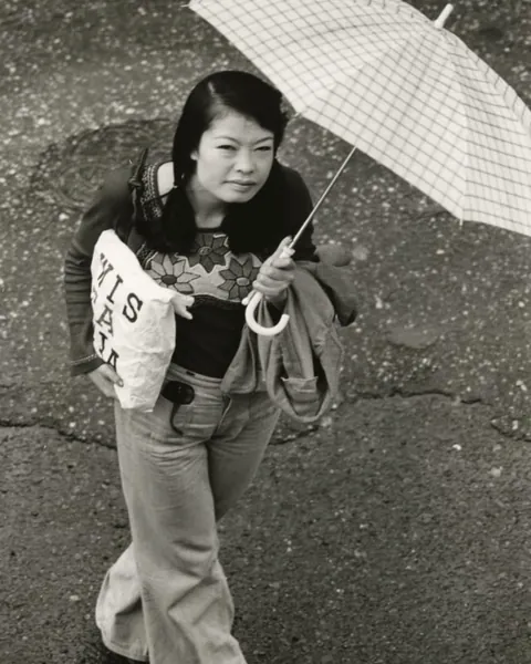 In 1973, Masahisa Fukase photographed his wife, Yōko Wanibe, leaving for work each day from their apartment window in Tokyo.