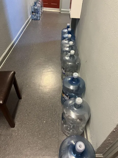 My Neighbor keeps leaving his water jugs outside of my apartment