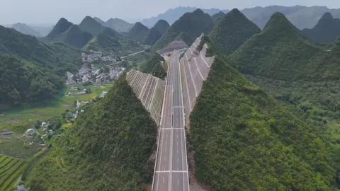 China cut a mountain in half to build a highway. Guizhou Province