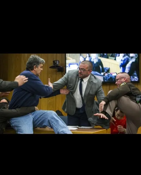 After hearing how Larry Nassar abused hundreds of young athletes, a father of three victims tried to attack him in court, shouting that he wanted “five minutes alone".