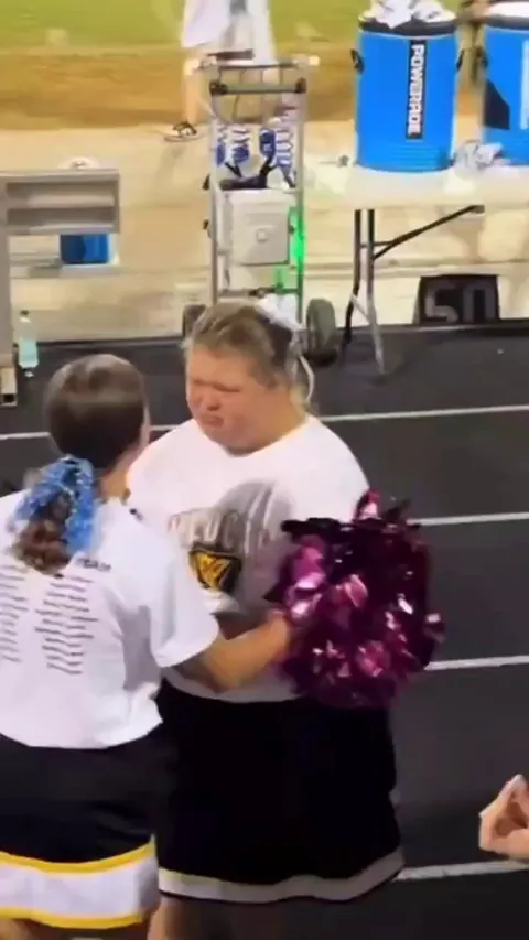 No one intended to go with this girl to the high school dance, but the team captain invited her to go with him