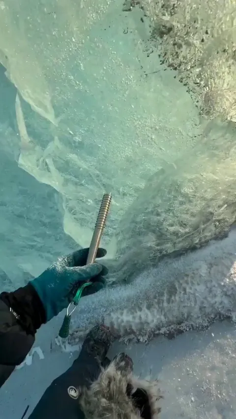 Ice screw in crystal clear ice