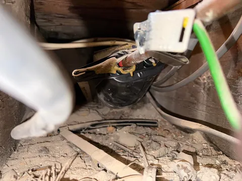 What is this ceramic submarine looking thing under my floorboards?