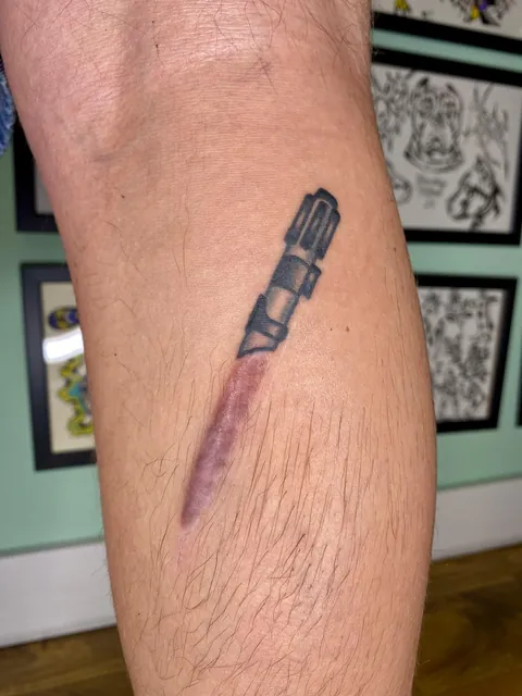 Lightsaber scar by me (@bowleytattoo) at Cosmic Frog Tattoo, Leeds!