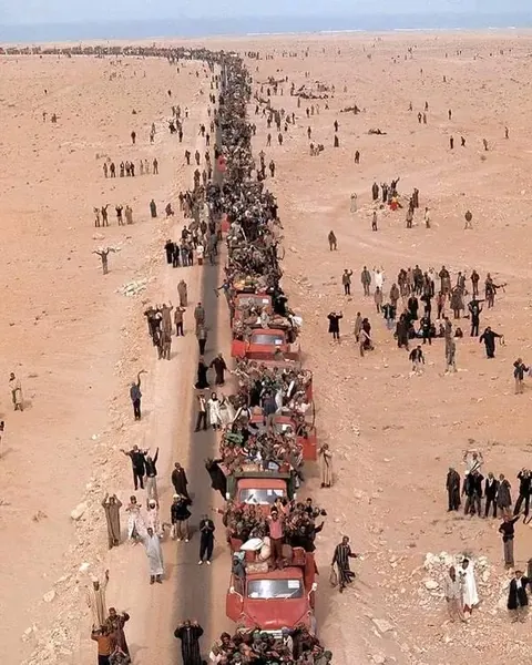 Column of the Moroccan Green March invading Western Sahara in 1975.