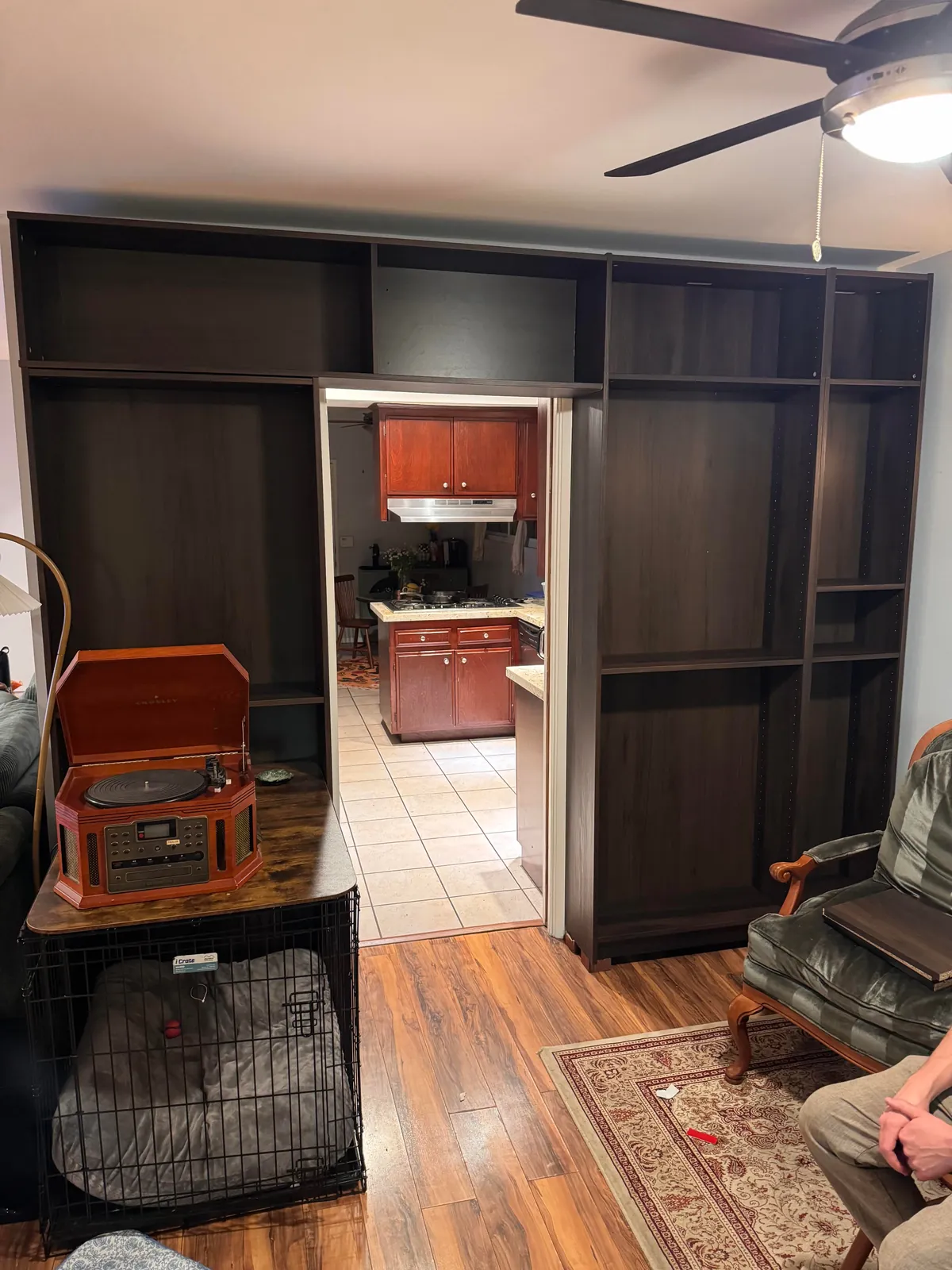 Built custom bookshelves by cutting and faceting ikea shelves together (before and after)