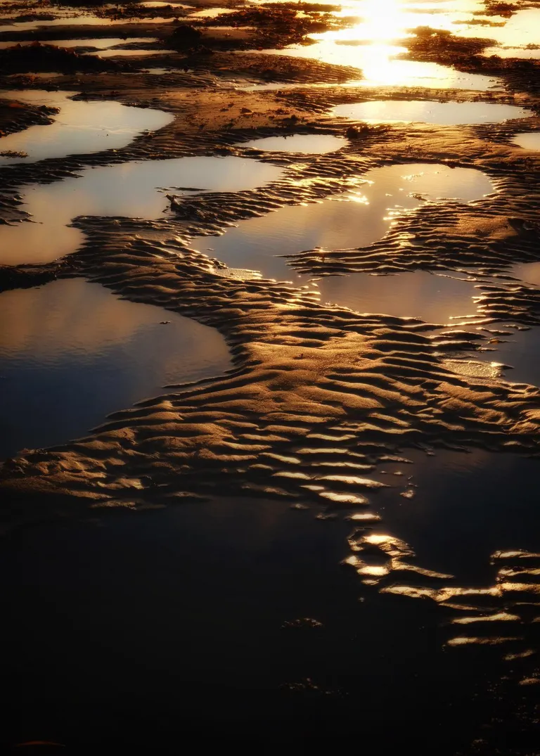 ITAP of the sun setting on the sand