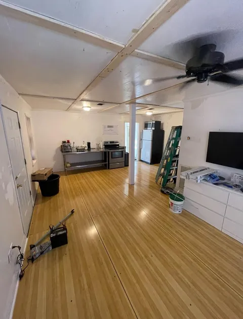 Upcycled some bowling alley lanes for flooring in my renovation project!