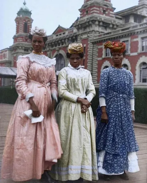 3 Women from Guadeloupe at the Ellis Island Immigration Station, 1911. Colorized by Sanna Dullaway, taken by Augustus Sherman.