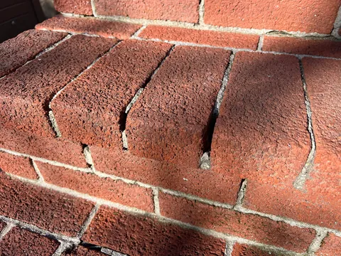 What can I use to fill the   gaps in these bricks?