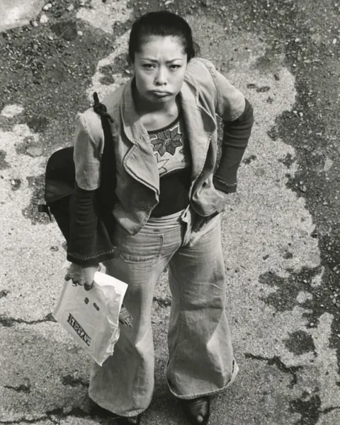 In 1973, Masahisa Fukase photographed his wife, Yōko Wanibe, leaving for work each day from their apartment window in Tokyo.