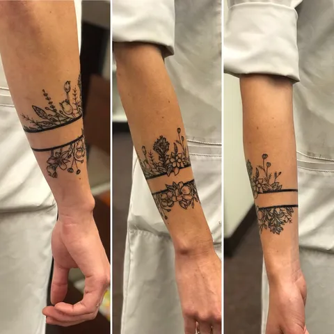 Wildflower inspired arm band by Derek at 550 Tattoo, Durango, CO.
