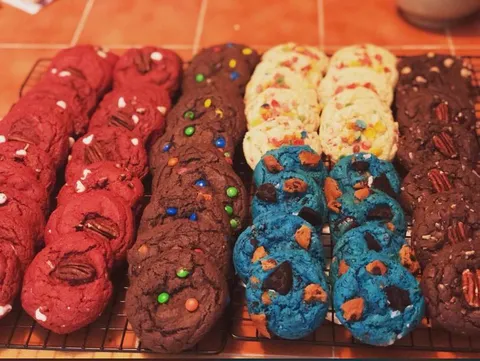 Lost my job on Thursday and baking is soothing my soul right now. From left to right : Red Velvet with white chocolate chips and pecans, Chocolate M&amp;M, Vanilla Fruity Pebble, Cookie Monster, and German Chocolate.