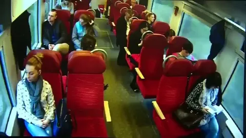 After hitting the emergency brakes seconds before they crash into a lorry that was stuck on a rail crossing, a train driver in Poland rushes through the cars to warn passengers. Nobody got seriously injured because of his actions.