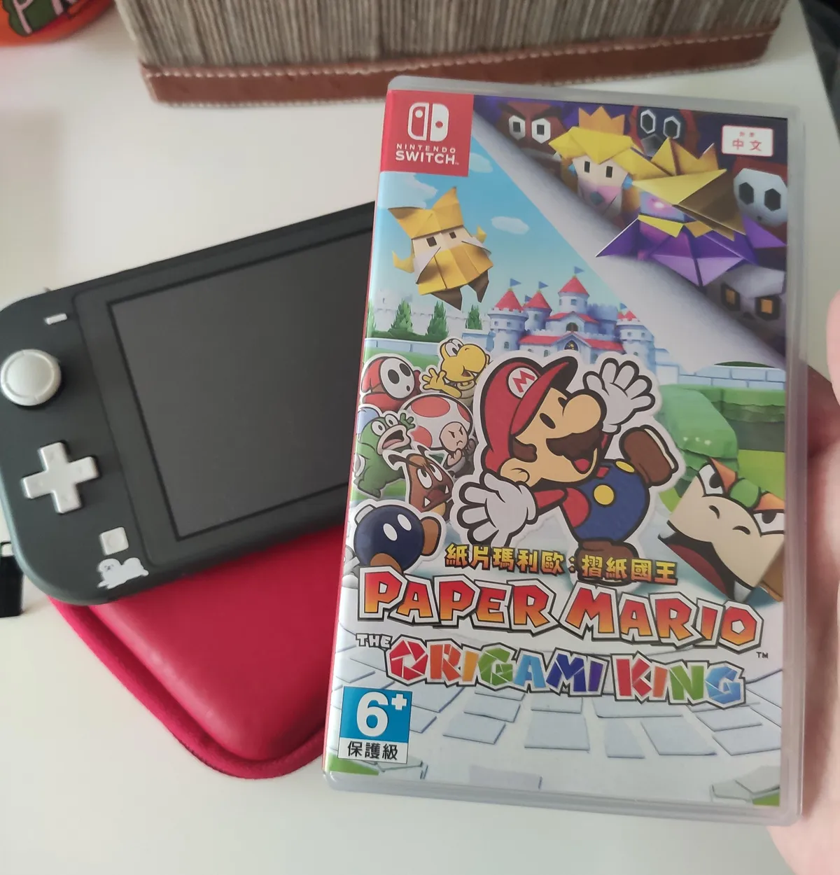 I got my copy of Paper Mario early! Played a few hours and it's great so far.