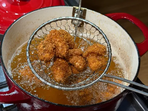 [homemade] boneless wings or saucy nugs or popcorn chicken or something.