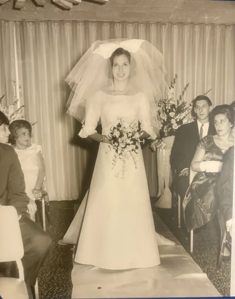 1964. My mom was a terrified girl from Brooklyn marrying into rich Chicago family. Bonus: twin flower girls!