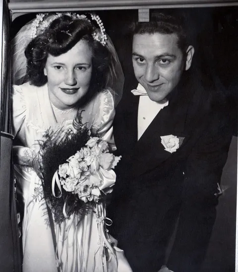 My grandparents at their wedding in 1949. My great grandfather (her dad) wouldn’t pay for the wedding because she married an Italian. 