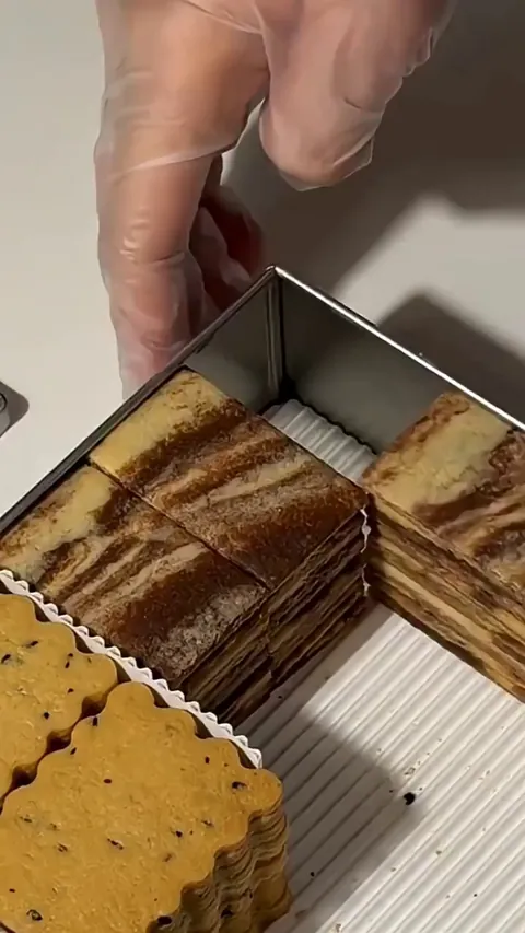 Packing baked pastries into a box