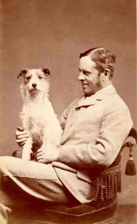Gentleman pose for photos with their beloved pups, circa 1880-1900