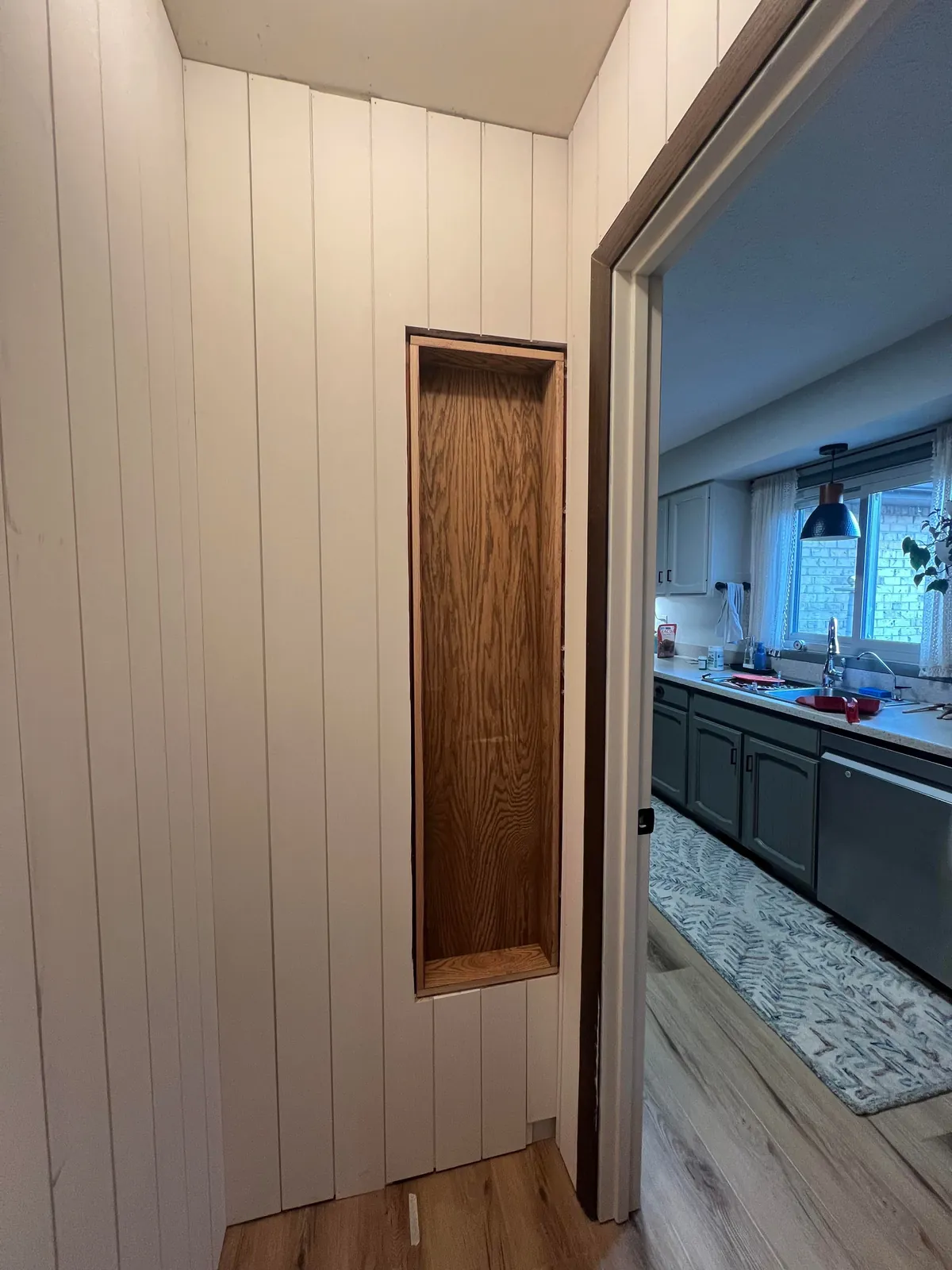Reclaimed unused coat closet for pantry expansion