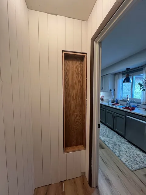 Reclaimed unused coat closet for pantry expansion