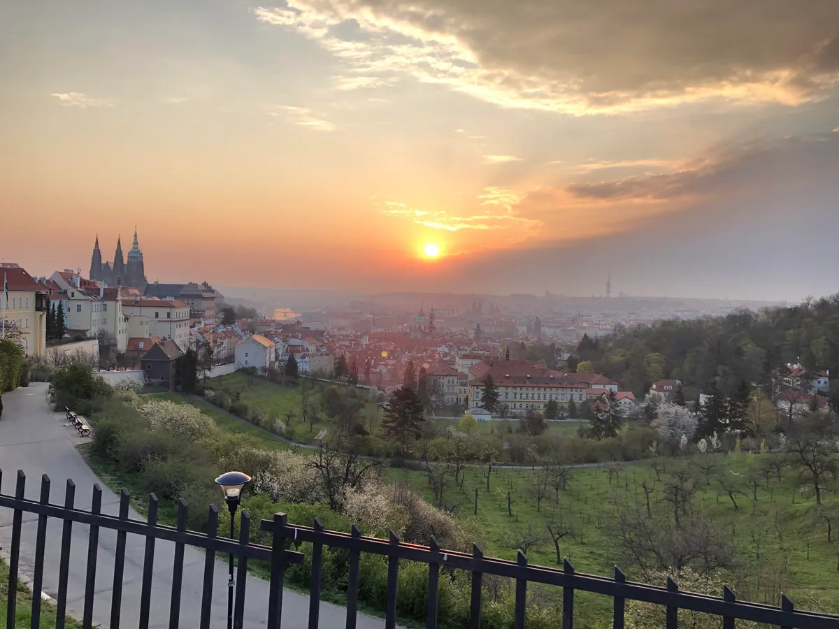 I have been traveling for 4 weeks around Europe after quitting a job I disliked. Walked through the old town at 5:00 to capture the sunrise over Prague this morning. There were some horizon level clouds that were pretty frustrating. Captured with my iPhone 8 and this image has not been edited.